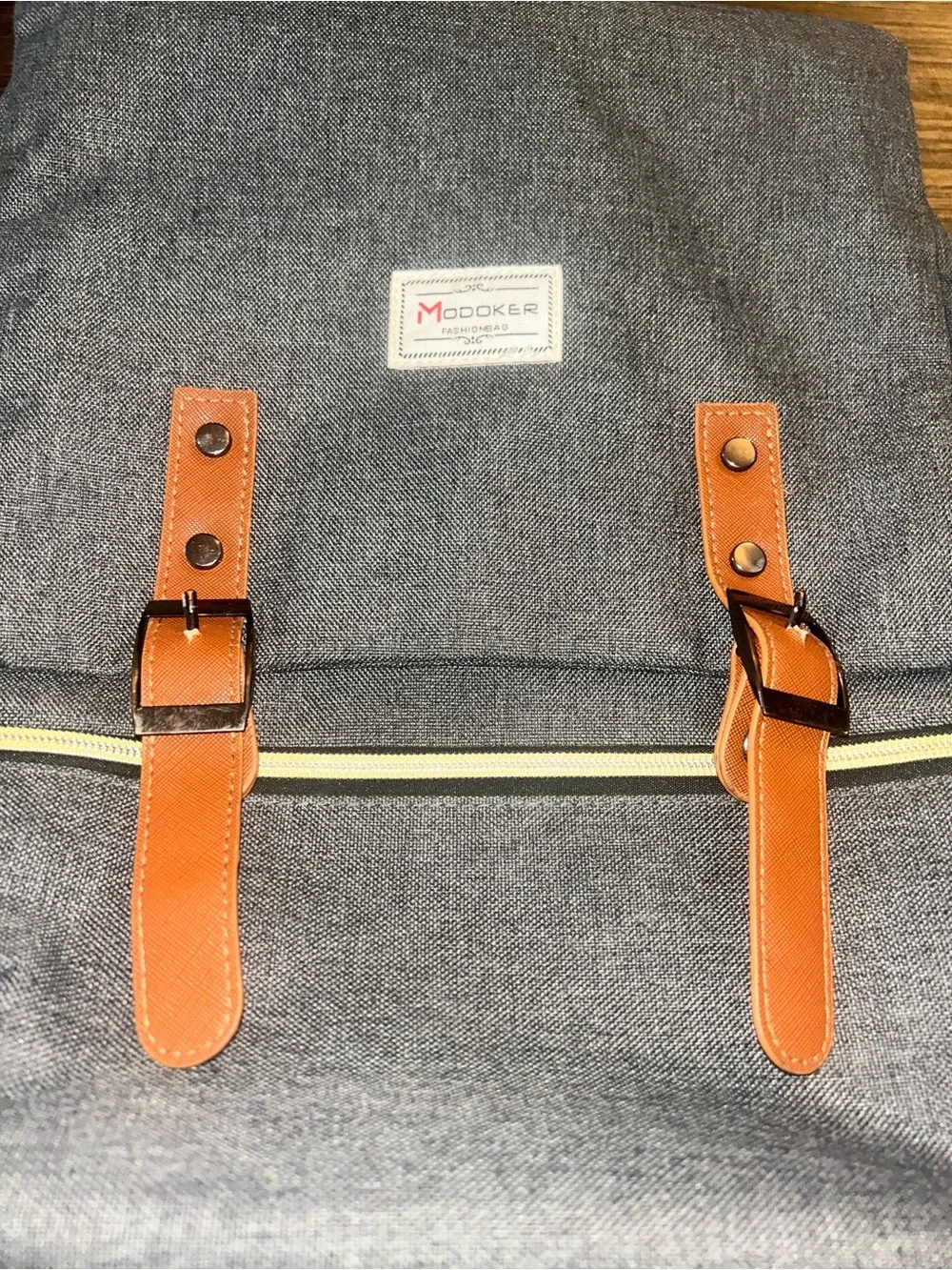 Gray Canvas Backpack with Tan / gold Accents with gold hardware - laptop